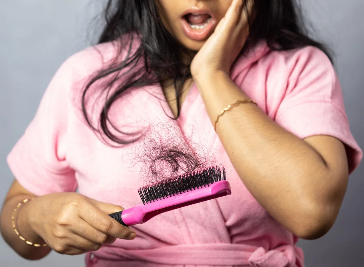 Hair Fall in Women: Causes, Myths & Effective Treatments