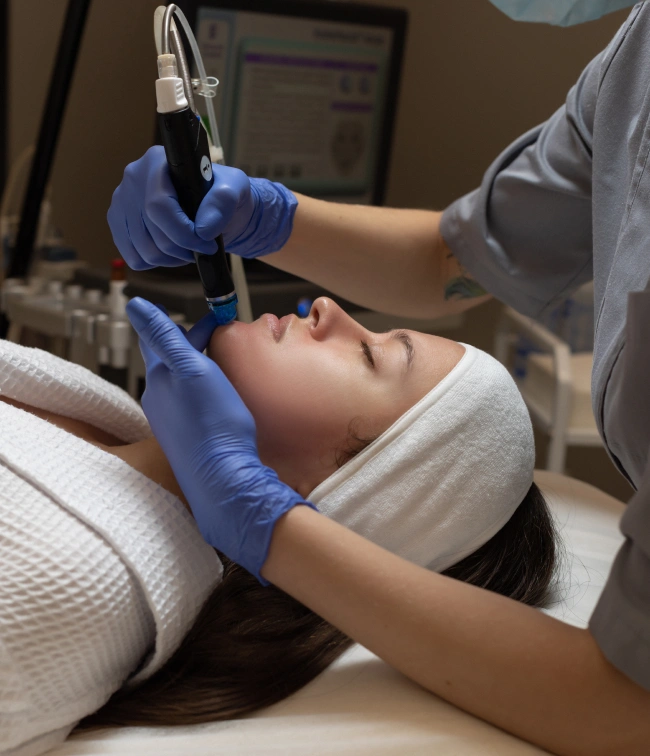 Skin doctor providing advanced skincare treatment